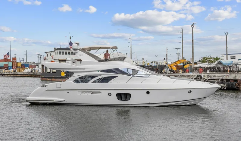 Susi Yacht Photos Pics 2005 Azimut 55 Flybridge yacht docked in a marina.