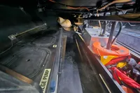 Interior of a 2007 TP 52 boat showing bilge pump and safety equipment.