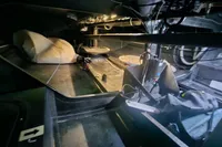 Interior view of a TP 52 yacht, showcasing equipment and storage, 2007 model.