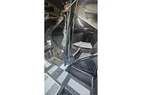 Interior of a 2007 TP 52 sailboat, showcasing ropes and equipment.