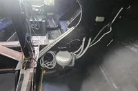 Interior of a 2007 TP 52 yacht showing a compact marine toilet setup.