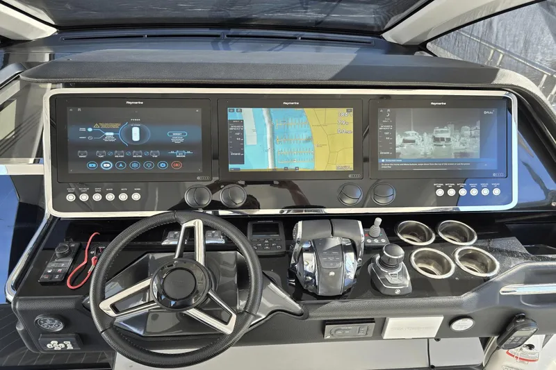 Making Memories II Yacht Photos Pics 2022 Azimut Verve 47 helm with advanced navigation and control systems.