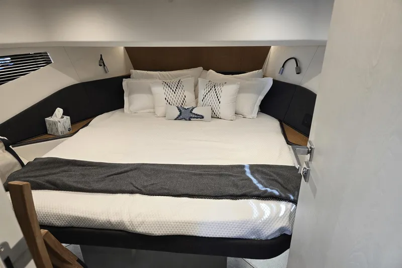 Making Memories II Yacht Photos Pics Luxurious bedroom interior of 2022 Azimut Verve 47 yacht with cozy bedding.