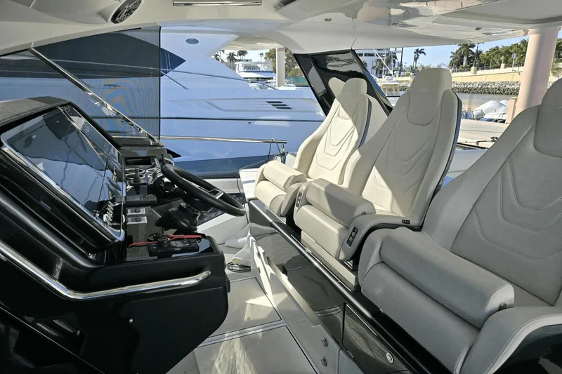 Making Memories II Yacht Photos Pics Interior cockpit of 2022 Azimut Verve 47 yacht with modern helm and luxurious seating.