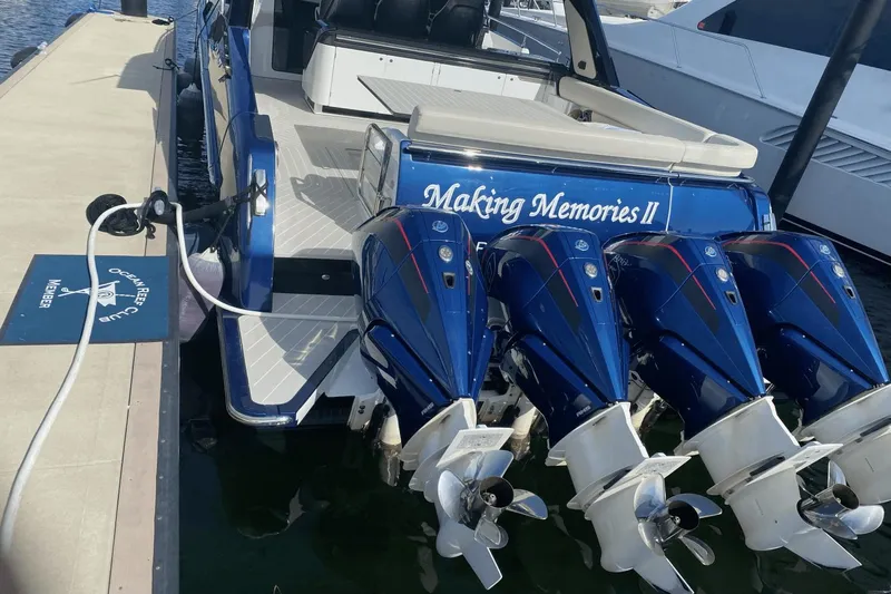 Making Memories II Yacht Photos Pics Azimut Verve 47 2022 docked, rear view with four outboard engines.