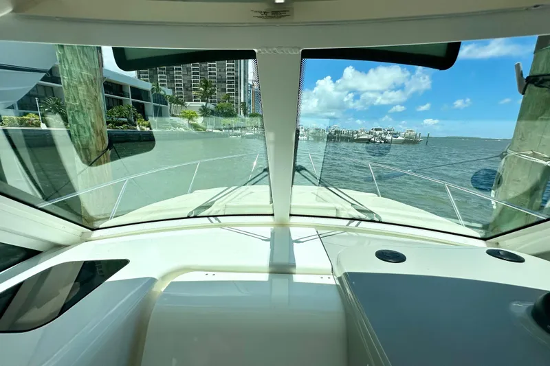 Extra Vagancia Yacht Photos Pics 2015 Boston Whaler 315 Conquest boat view from cockpit, overlooking marina and waterfront.