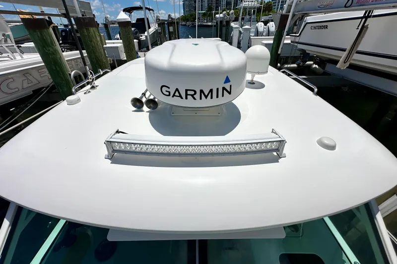 Extra Vagancia Yacht Photos Pics 2015 Boston Whaler 315 Conquest boat with Garmin radar and LED light bar.