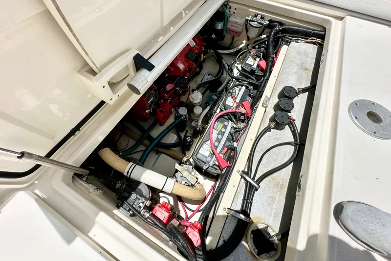 Extra Vagancia Yacht Photos Pics Engine compartment of a 2015 Boston Whaler 315 Conquest, showing wiring and components.