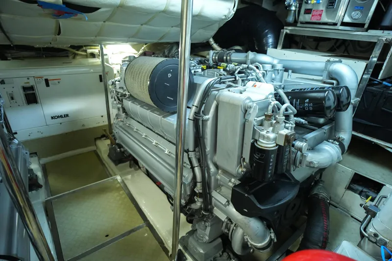 Freedom 2 Yacht Photos Pics Engine room of 2010 Pershing 72 yacht, featuring a powerful marine engine.