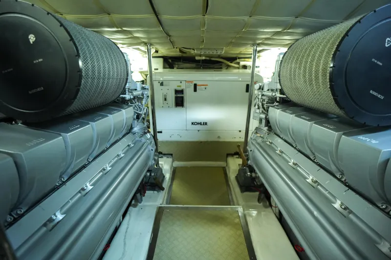 Freedom 2 Yacht Photos Pics Engine room of 2010 Pershing 72 yacht, featuring dual engines and Kohler generator.