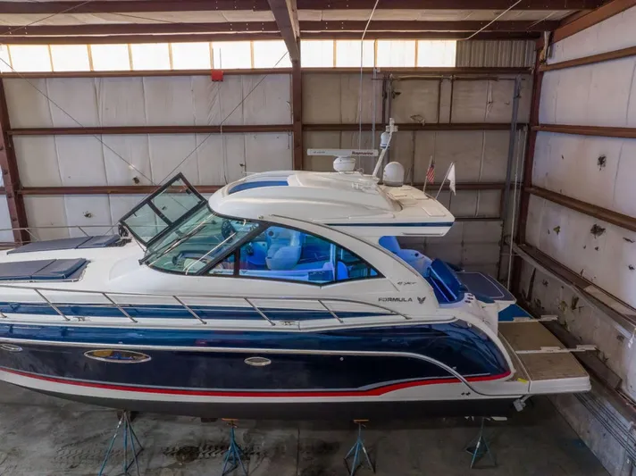 Beautiful Now Yacht Photos Pics 2015 Formula 45 Yacht in storage, featuring sleek design and modern amenities.