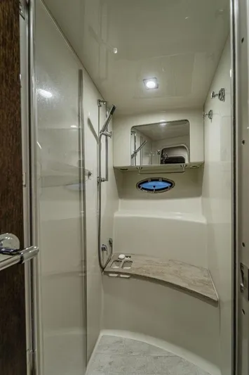 Beautiful Now Yacht Photos Pics Luxurious bathroom in 2015 Formula 45 Yacht with modern shower and porthole window.