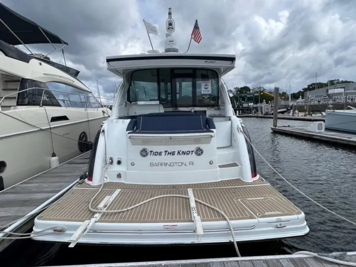 Beautiful Now Yacht Photos Pics 2015 Formula 45 Yacht docked at marina, rear view with American flag.