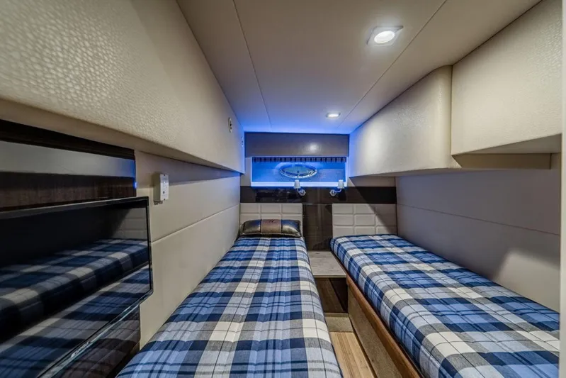 Beautiful Now Yacht Photos Pics Cozy twin cabin with plaid bedding in 2015 Formula 45 Yacht.