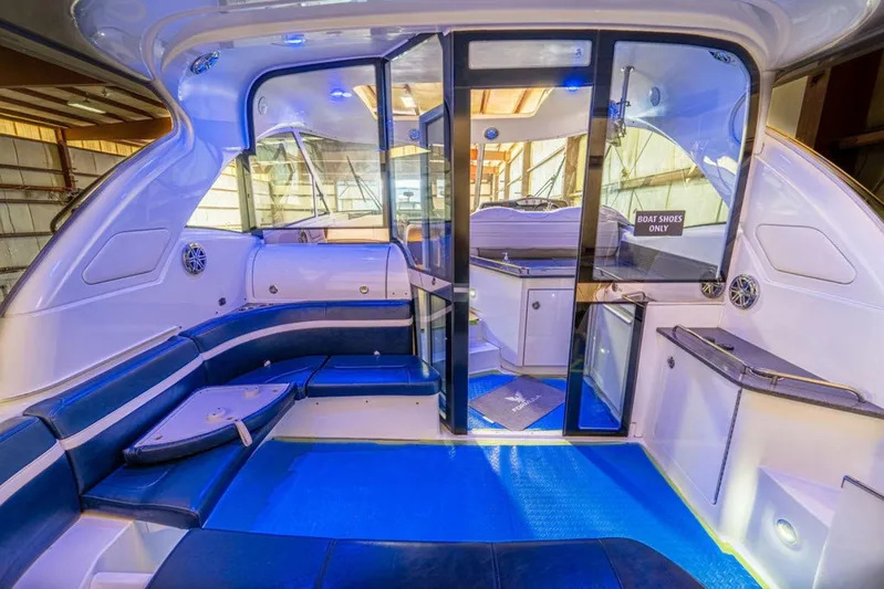 Beautiful Now Yacht Photos Pics Luxurious interior of 2015 Formula 45 Yacht with blue seating and modern amenities.