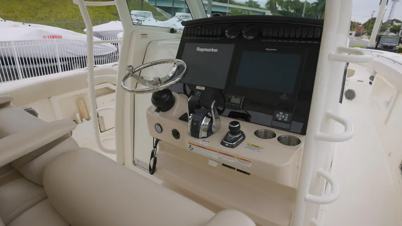  Yacht Photos Pics 2018 Boston Whaler 380 Outrage helm with advanced navigation systems and controls.