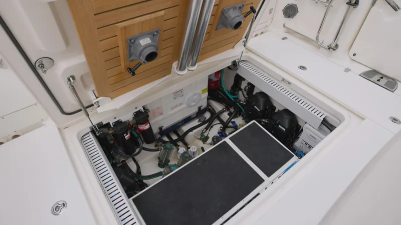  Yacht Photos Pics 2018 Boston Whaler 380 Outrage engine compartment with visible components and wiring.