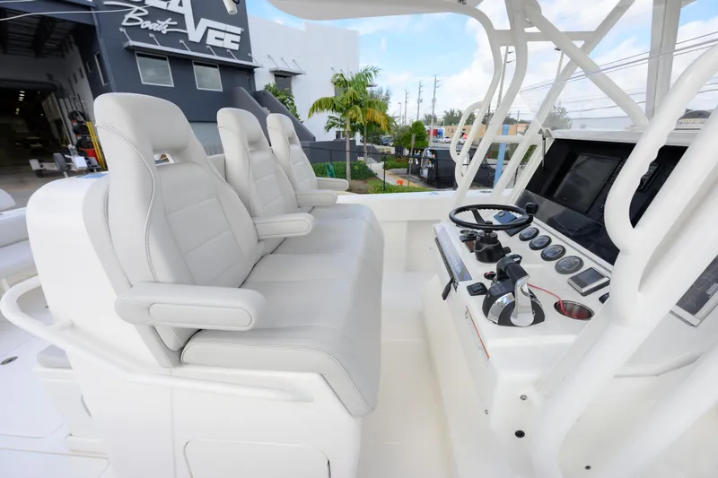 Seavee Yacht Photos Pics 2022 SeaVee 370Z boat cockpit with modern controls and comfortable seating.