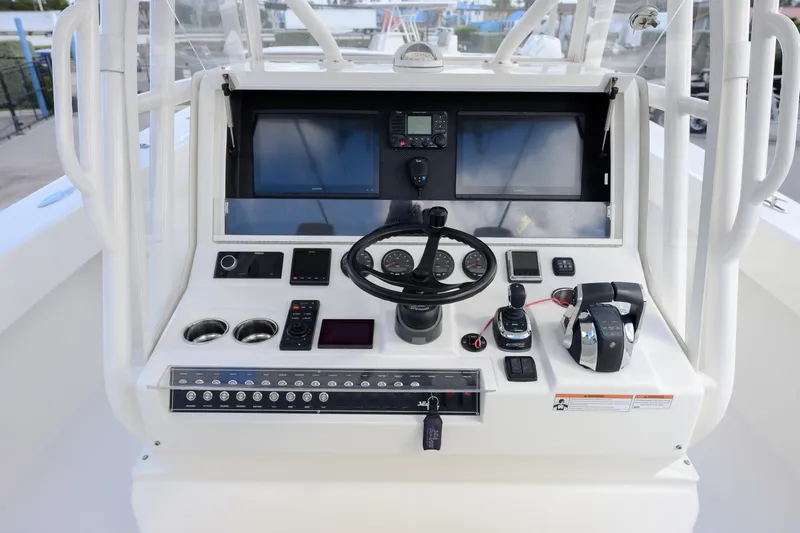 Seavee Yacht Photos Pics 2022 SeaVee 370Z boat helm with advanced navigation and control systems.