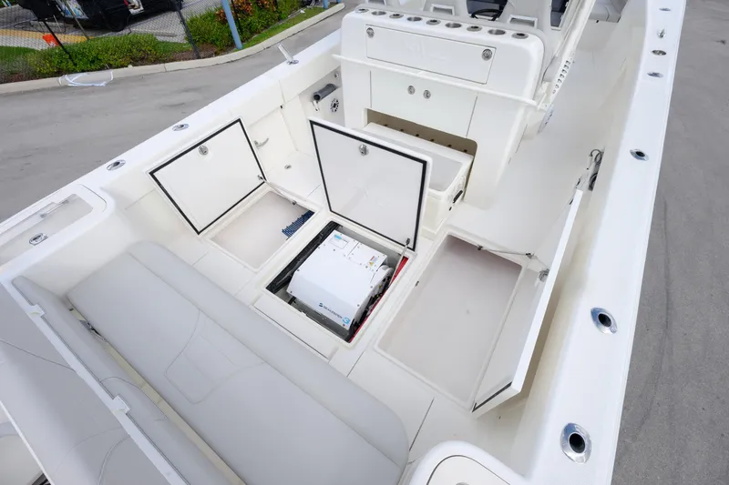 Seavee Yacht Photos Pics 2022 SeaVee 370Z boat interior with open storage compartments and seating.