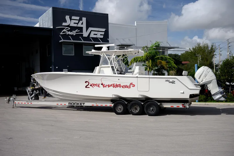 Seavee Yacht Photos Pics 2022 SeaVee 370Z boat on trailer outside SeaVee Boats facility.