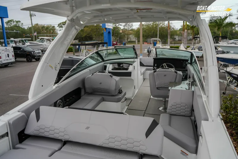  Yacht Photos Pics 2026 Four Winns H9 OB boat interior with modern seating and sleek design.