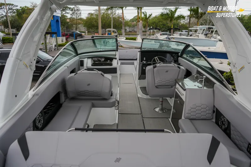  Yacht Photos Pics 2026 Four Winns H9 OB boat interior with modern seating and sleek design.