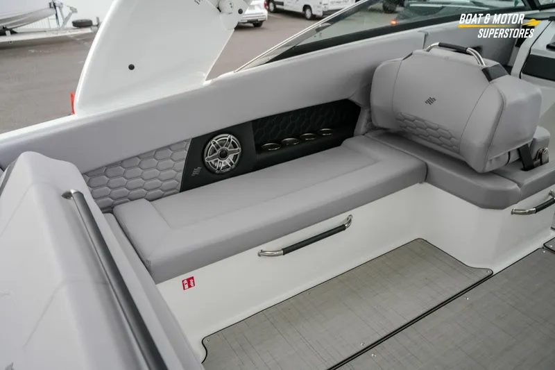  Yacht Photos Pics 2026 Four Winns H9 OB boat interior with gray seating and speaker detail.