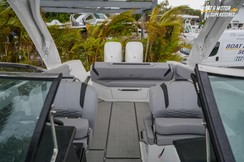  Yacht Photos Pics 2026 Four Winns H9 OB boat interior with gray seating and modern design.