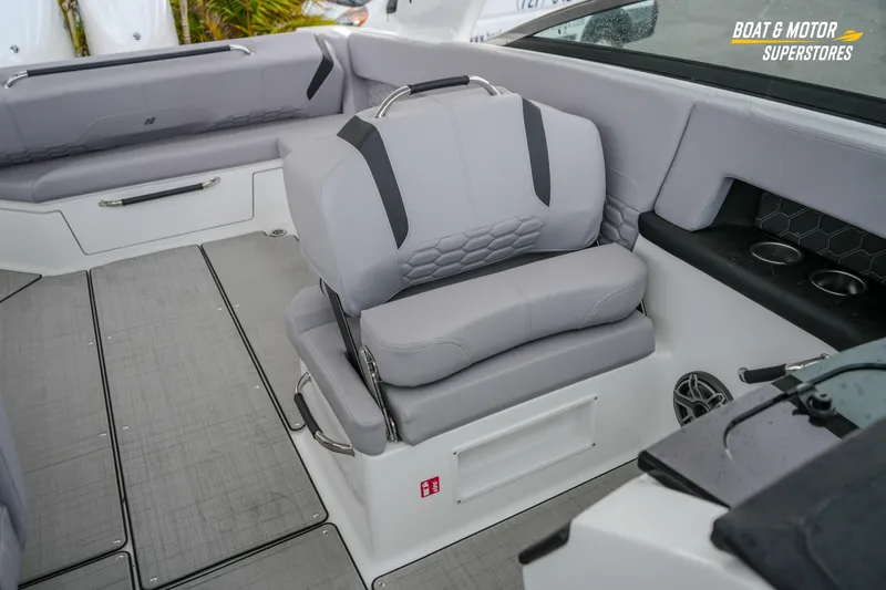  Yacht Photos Pics 2026 Four Winns H9 OB boat interior with gray seating and modern design elements.