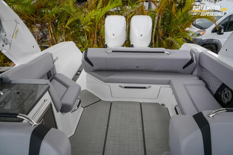  Yacht Photos Pics Interior of 2026 Four Winns H9 OB boat with gray seating and modern design.