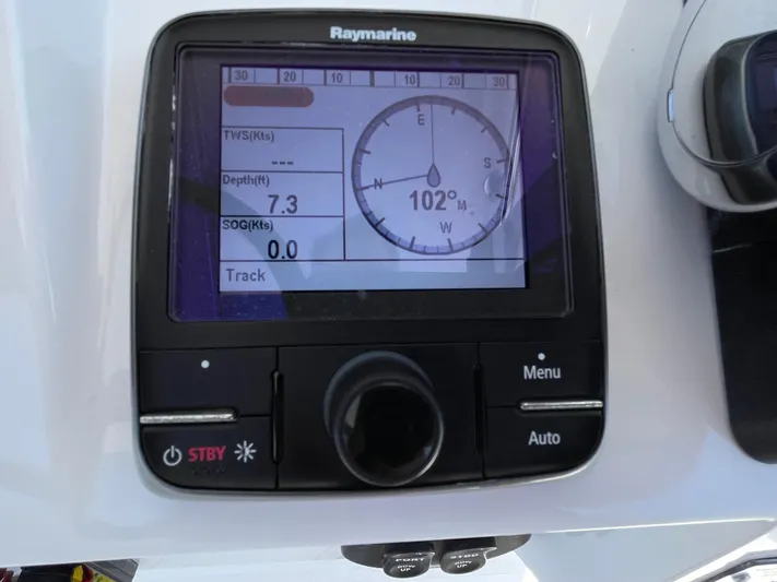  Yacht Photos Pics Raymarine navigation display on 2014 Southport 27 Center Console showing depth and compass.
