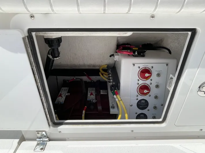  Yacht Photos Pics Battery compartment of 2014 Southport 27 Center Console boat with electrical panel.
