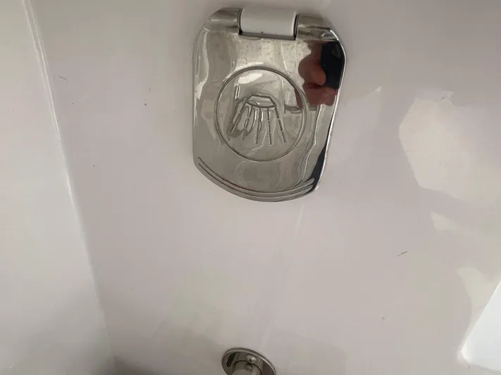  Yacht Photos Pics Chrome shower cover on 2014 Southport 27 Center Console boat.