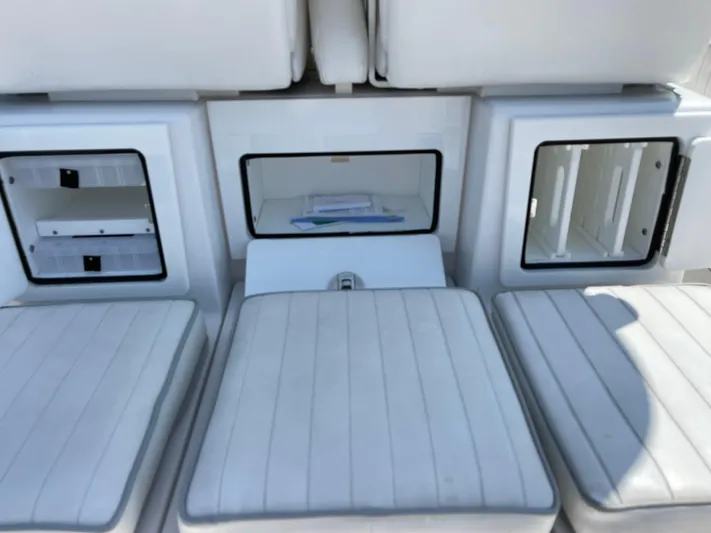  Yacht Photos Pics 2014 Southport 27 Center Console boat seating and storage compartments.