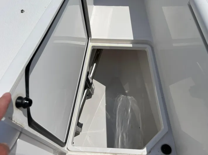  Yacht Photos Pics Open storage compartment on a 2014 Southport 27 Center Console boat.