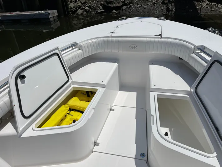  Yacht Photos Pics 2014 Southport 27 Center Console boat with open storage compartments.