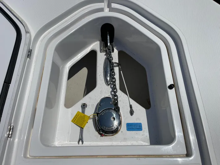  Yacht Photos Pics Anchor compartment of 2014 Southport 27 Center Console boat with chain and winch.