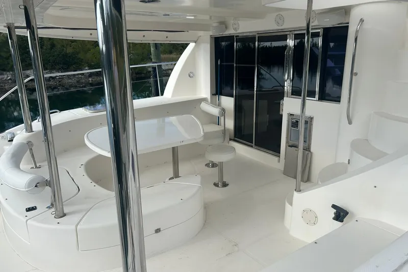 Shearwater Yacht Photos Pics 2011 Leopard 47 Powercat yacht interior with seating area and table.
