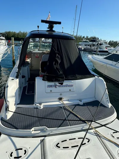 Red Scorpion Yacht Photos Pics 2007 Sea Ray 400 Sundancer docked at marina.