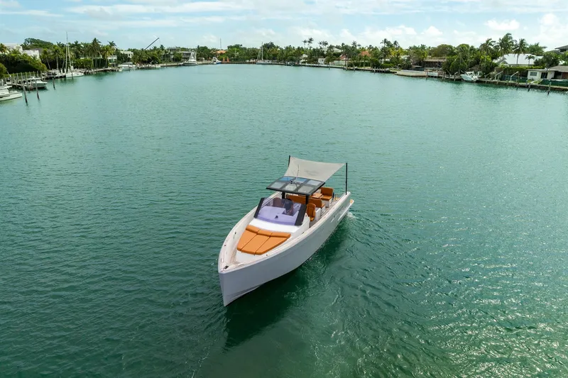 Elise Yacht Photos Pics 2017 Fjord 40 Open yacht cruising in a serene, tropical bay.
