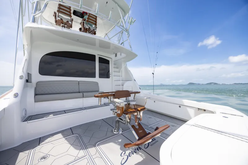 Seven Seas Yacht Photos Pics 2024 Viking 58 Convertible yacht deck with seating and ocean view.