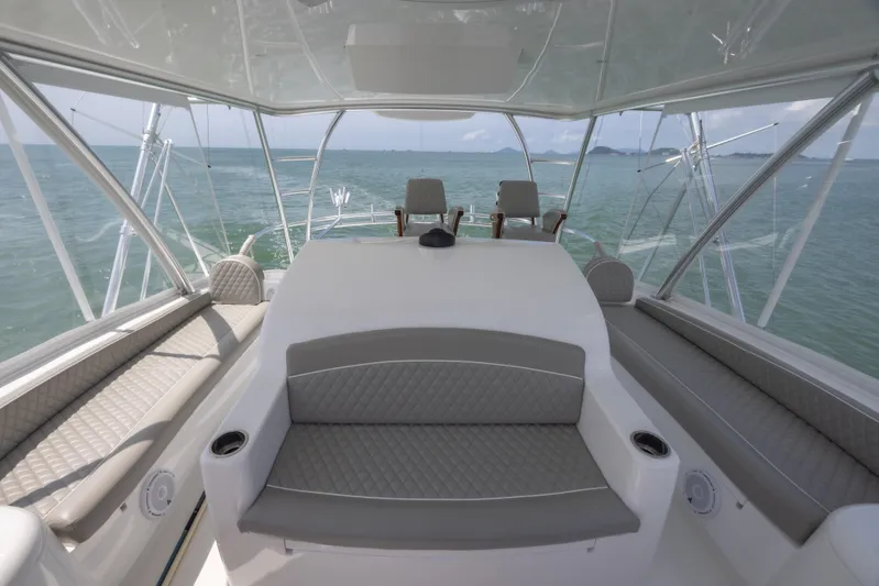 Seven Seas Yacht Photos Pics Luxurious interior of 2024 Viking 58 Convertible yacht with ocean view.