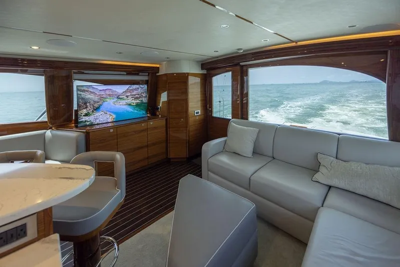 Seven Seas Yacht Photos Pics Luxurious interior of 2024 Viking 58 Convertible yacht with ocean view and modern amenities.