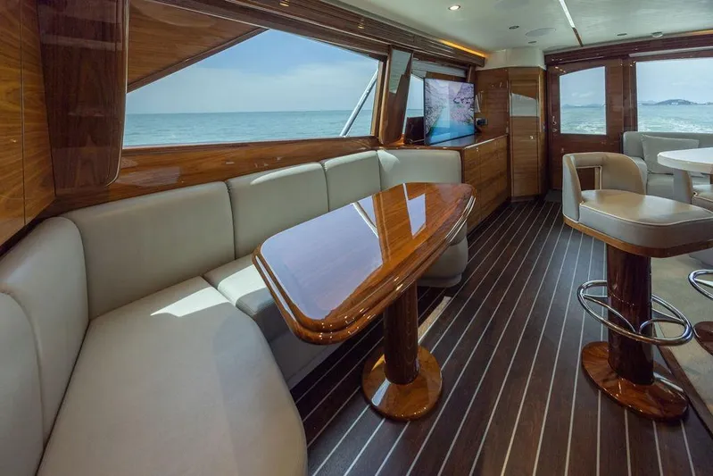 Seven Seas Yacht Photos Pics Luxurious interior of 2024 Viking 58 Convertible yacht with elegant wood finishes.