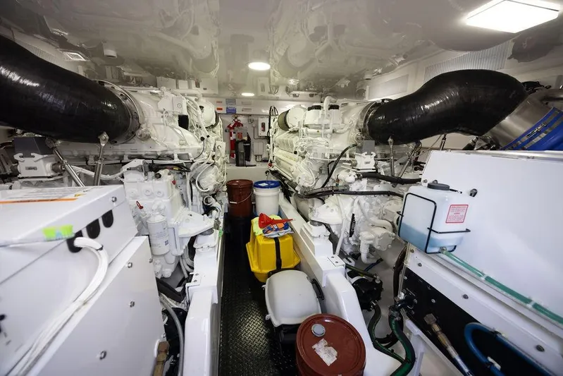 Seven Seas Yacht Photos Pics Engine room of 2024 Viking 58 Convertible yacht, showcasing powerful machinery and equipment.