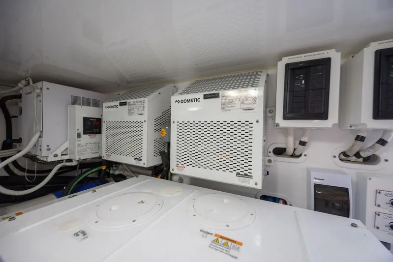 Seven Seas Yacht Photos Pics Engine room of 2024 Viking 58 Convertible yacht with Dometic systems and control panels.