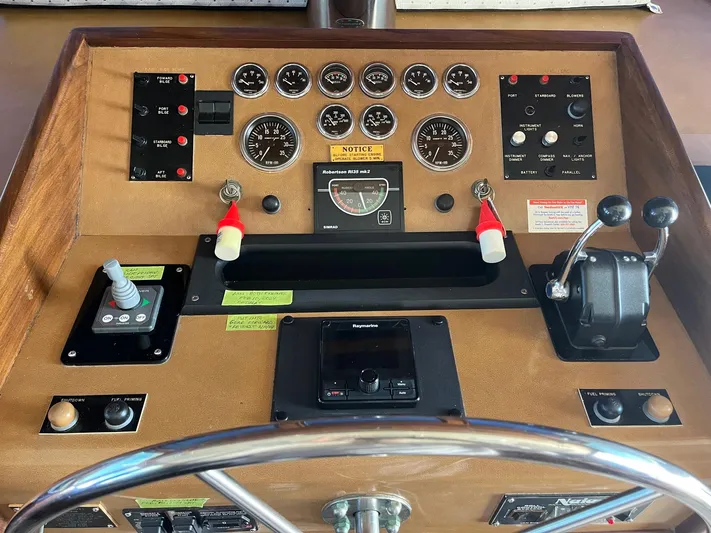 Lady T Yacht Photos Pics Control panel of a 1986 Hatteras 70' Cockpit Motor Yacht.