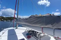 Sailing yacht Leopard 48, 2018 model, docked under a clear blue sky.