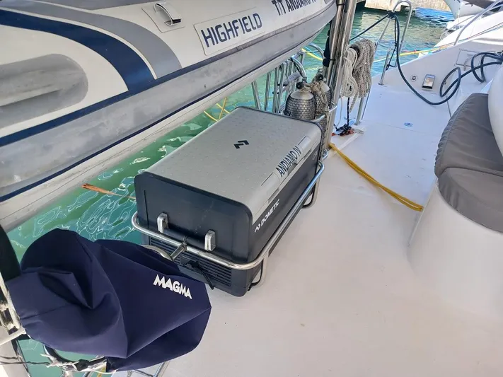 Andiamo IV Yacht Photos Pics Leopard 48 yacht deck with Highfield boat and Magma grill, 2018 model.